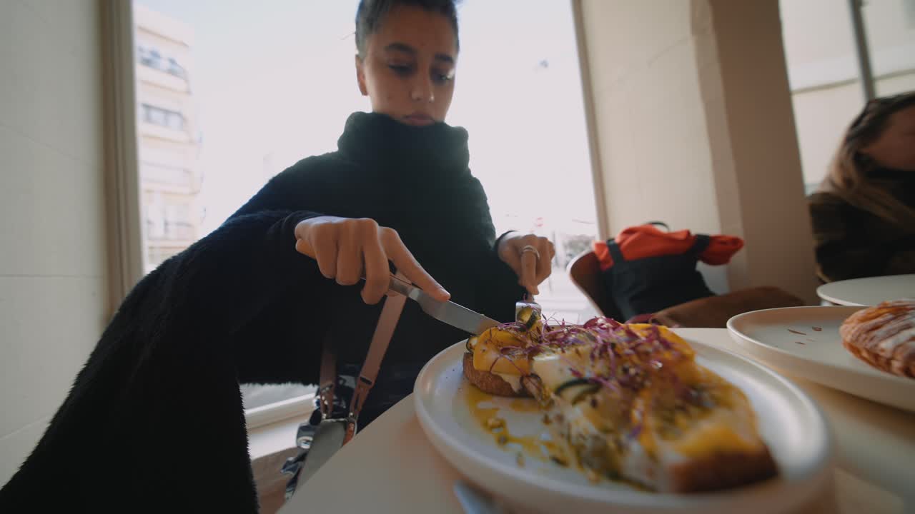 Woman enjoying brunch in a cafe