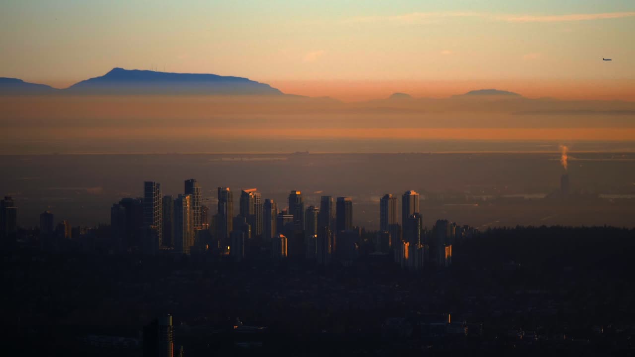 Scenic Sunset In Metrotown Neighbourhood In Burnaby, British Columbia, Canada. Aerial Wide Shot