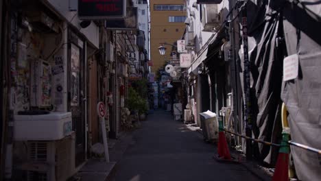 exploring a dark and narrow alleyway in tokyo, japan