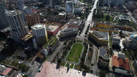 heart of tirana: aerial view capturing the pulse of the city at skanderbeg square, a vibrant hub of activity