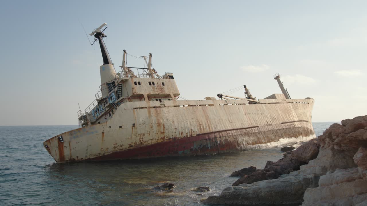 Abandoned old boat with rust ran aground