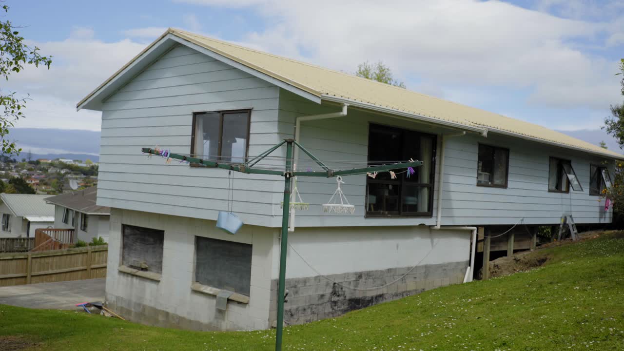 new zealand household the house and the backyard in a sunny day