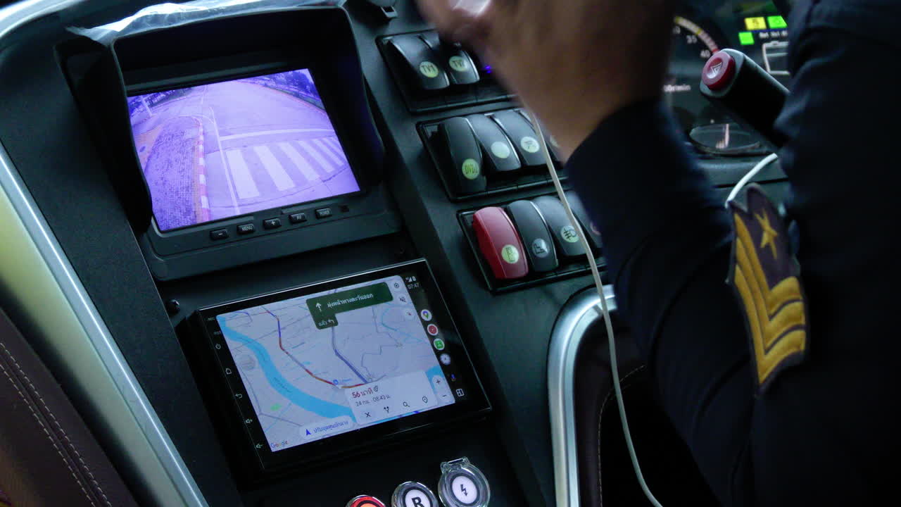 Electric bus driver navigating through Bangkok using a digital map while transporting tourists. Eco-friendly transportation and advanced navigation technology in urban tourism.