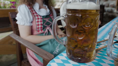 woman celebrating oktoberfest with beer