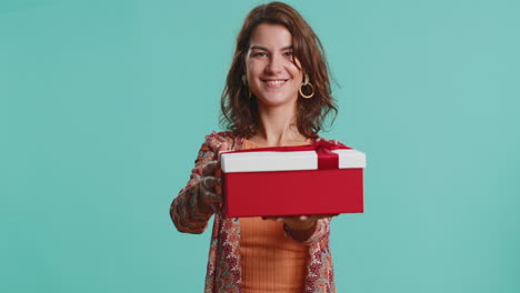woman presenting birthday gift box offer wrapped present career bonus celebrating party sale