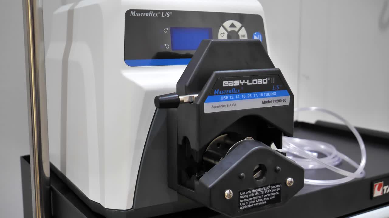 Slow motion shot of an electronic machine used for plastic tubing treatments in a clinic