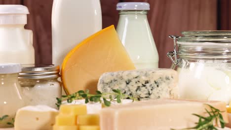 various dairy items displayed on a wooden surface