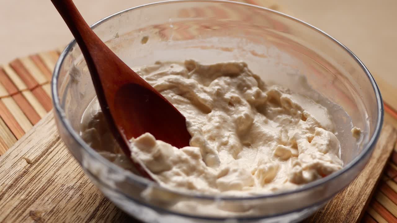 Top view of milk cream in a container on table