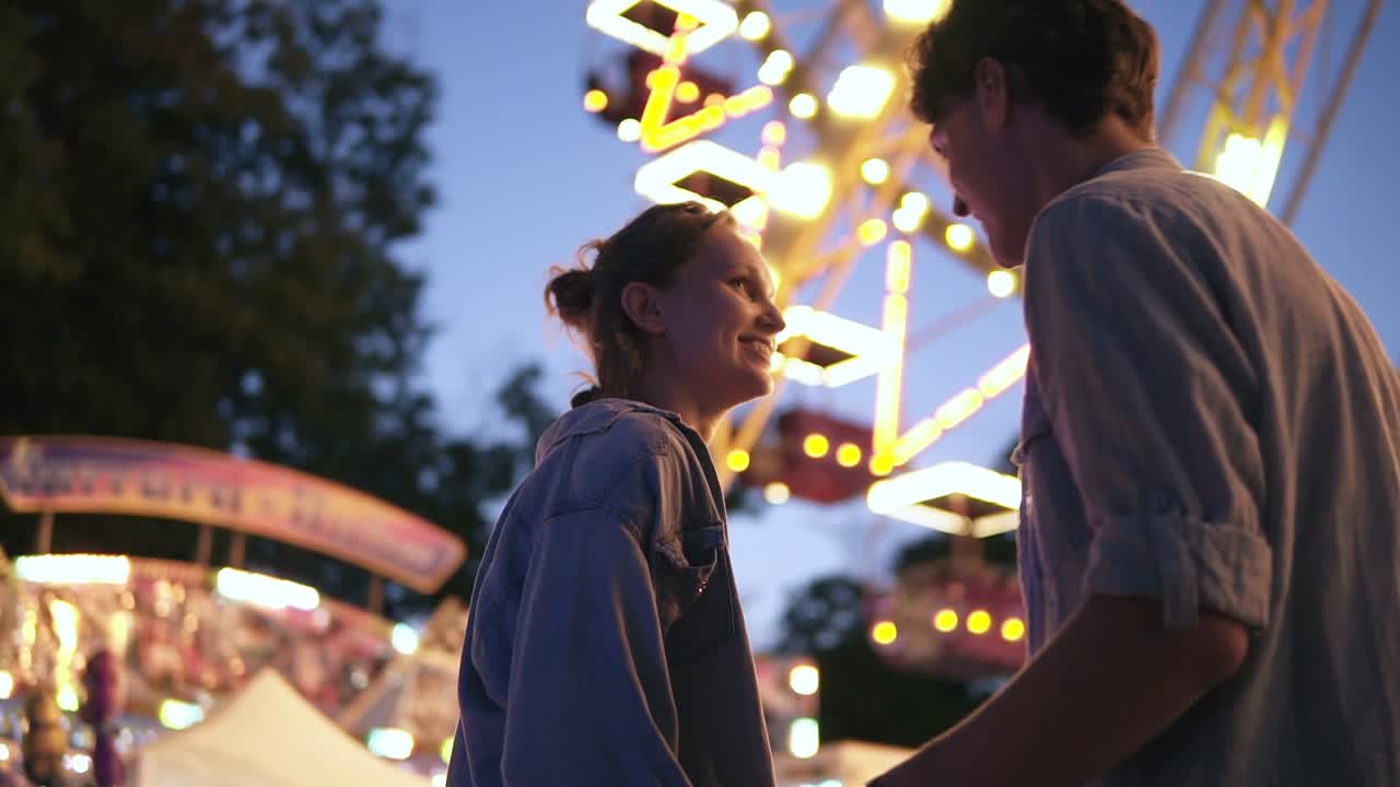 Free stock video - Young couple dating, meeting at the amusement park ...