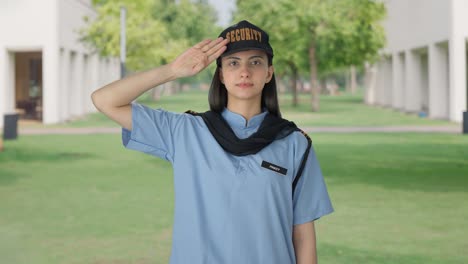 indian female security guard saluting