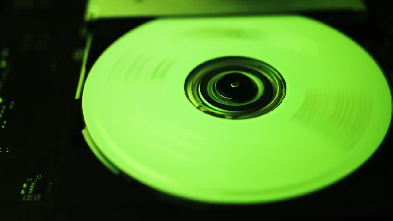 CD rom with green rgb lights and a cd that inside turns