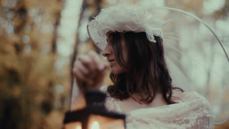 a mysterious woman in white holding a lantern in a forest