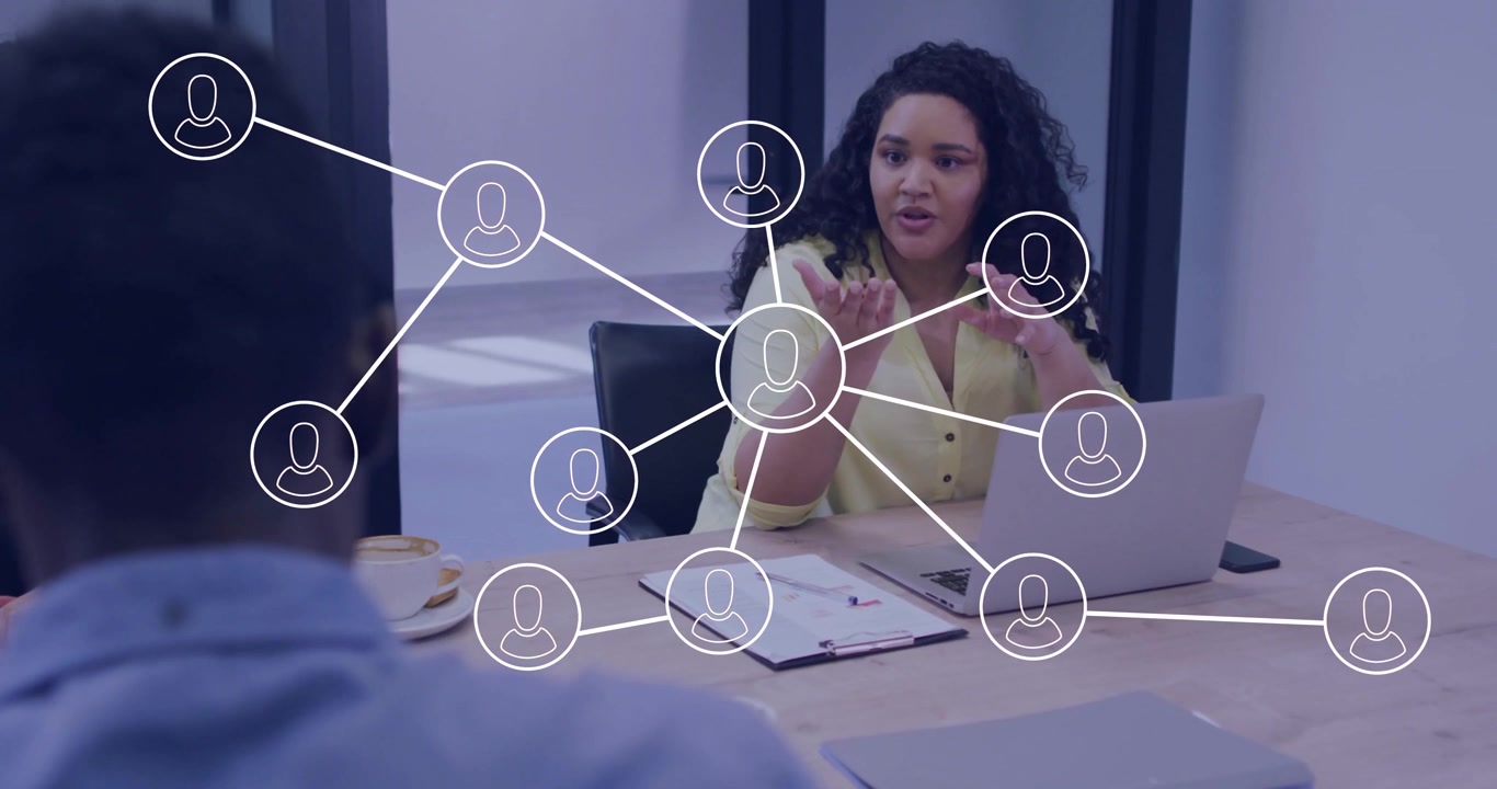 Presenter gesturing in business meeting visualizing nodes shifting into ear and user icons