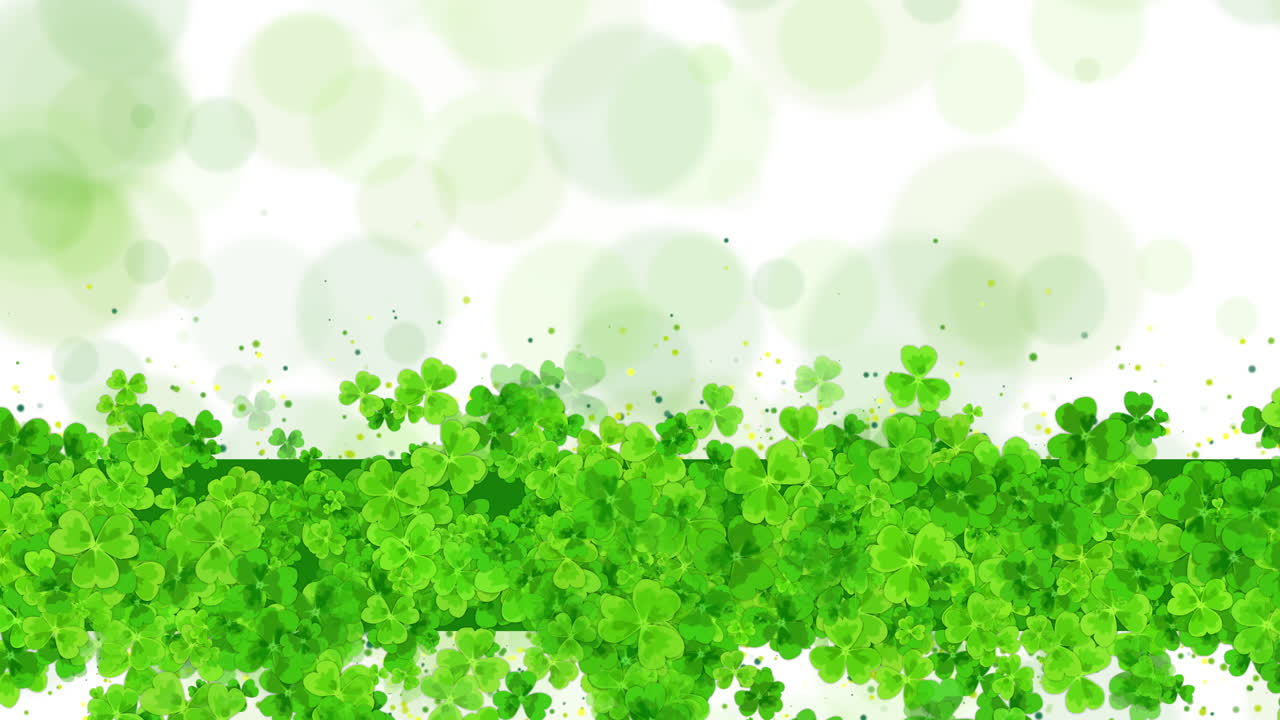 St. Patrick's day horizontal loop background with shamrock leaves. Copy space. Green ribbon with animated leaves.