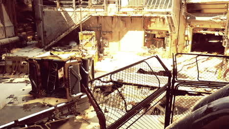 abandoned industrial site showing heavy machinery and decay during daytime