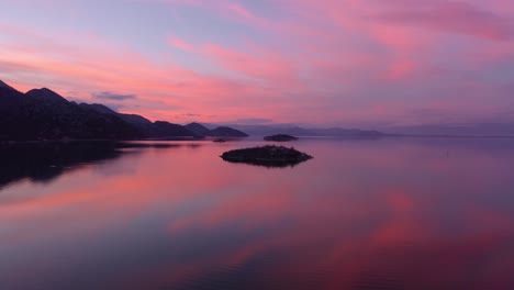 dramatic sunset over lake skadar and the dinaric mountains in europe