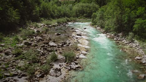 aerial view of the rocks in water at the soca river in slovenia, europe.