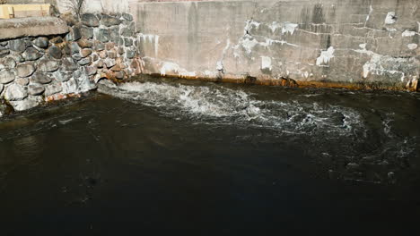 controlled release of sediment from a tank, water travels through a constructed channel culvert pipe