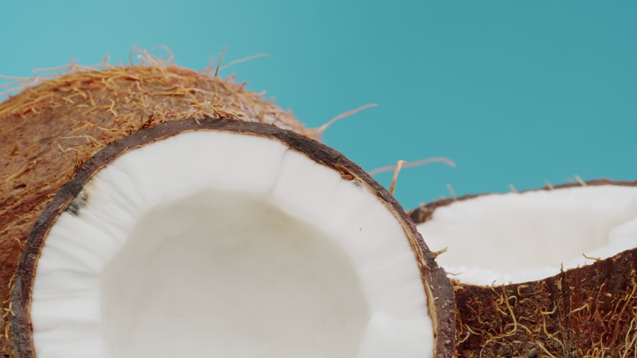 Close-up of two halves of a coconut