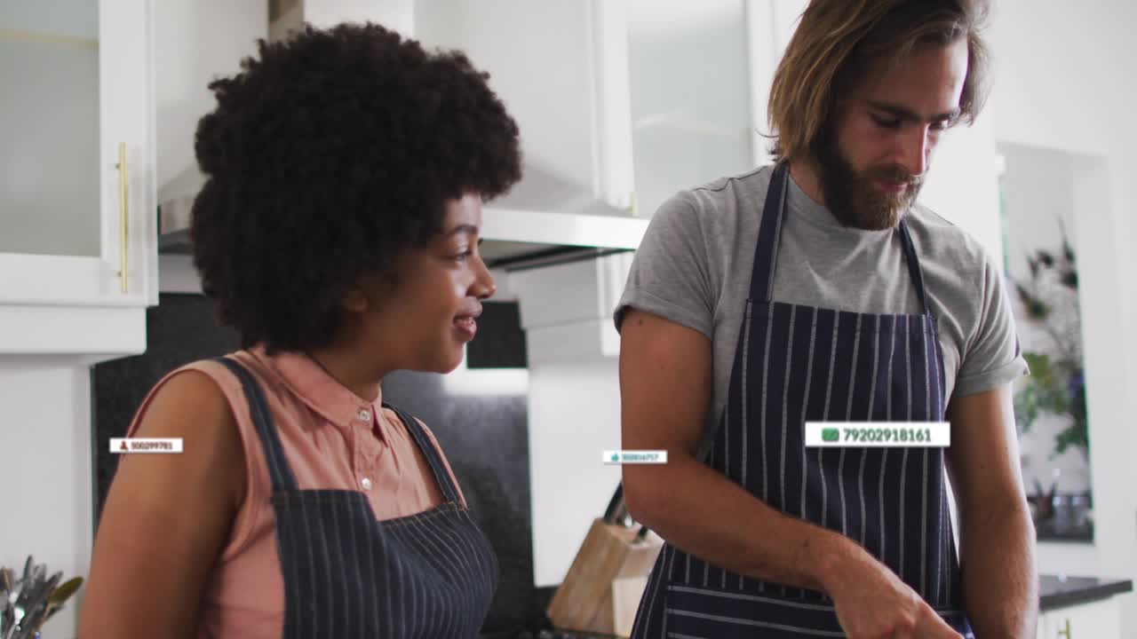 As camera zooming out pair slicing vegetables on counter for cooking demo with floating data labels