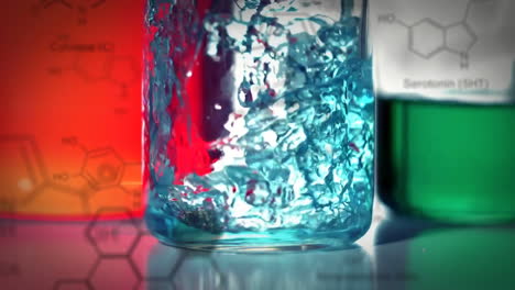 laboratory beakers with data and structural formula of chemical compounds in the foreground