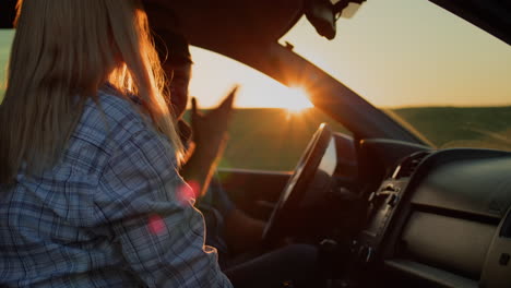 the couple argue furiously in the car. family conflict concept
