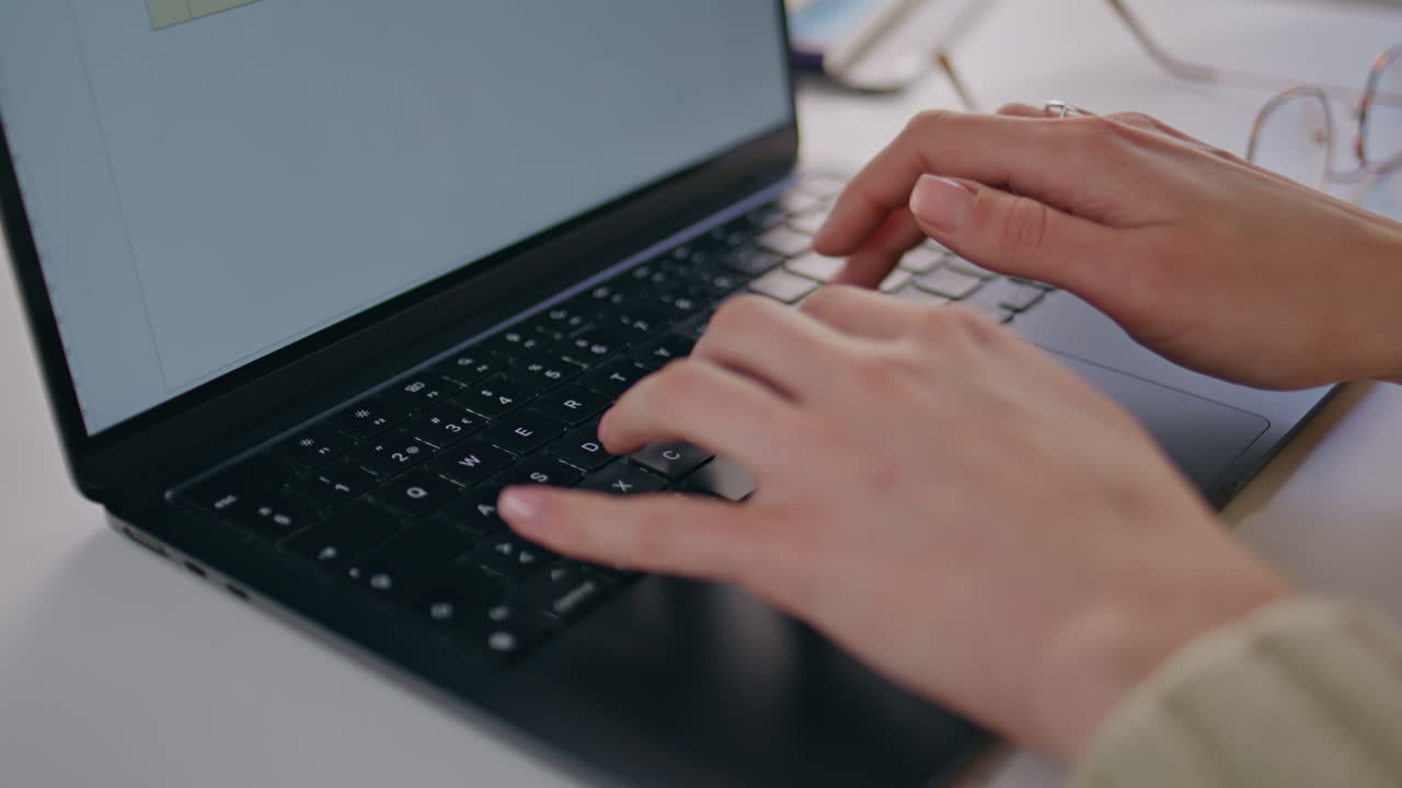 Lady hands texting laptop keyboard at remote workplace closeup. Woman typing