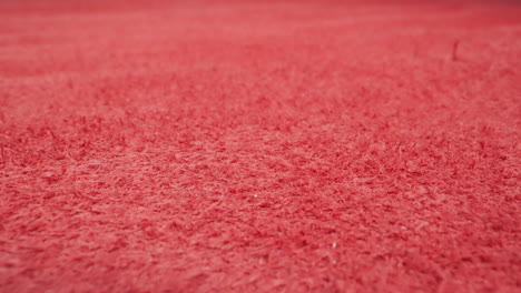 Textured-surface-of-red-cow-leather-material-sheet