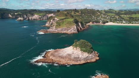 flying over small islands in new zealand's north island