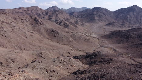 aerial flying in dry rocky rugged mountains