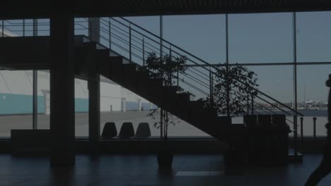 airport interior with stairs and windows