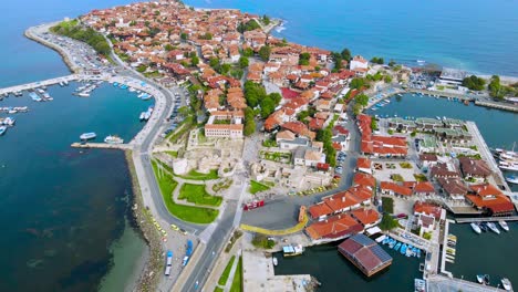 Drone-aerial-view-over-a-UNESCO-World-Heritage-Old-Town-of-Nessebar,-Bulgaria