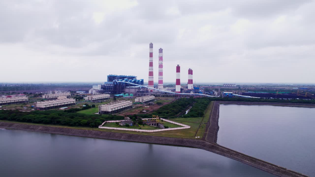 NTPC Kudgi Thermal Power Plant with Reservoir, sky and clouds. day time, semi circle shot, drone shot, 4k