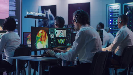 mission control team during launch