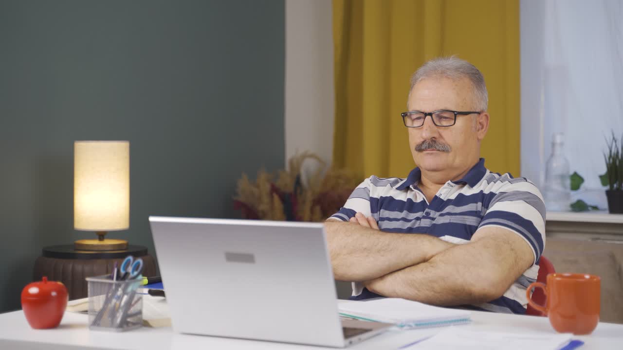 Home office worker old man confident.