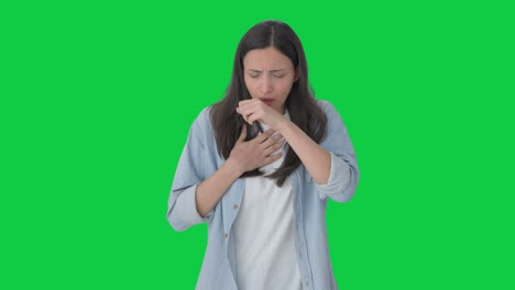 sick indian girl suffering from cold and cough green screen