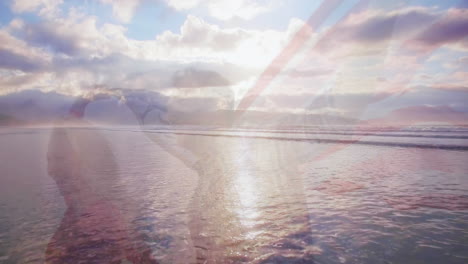 animation of landscape with ocean over caucasian couple with american flag at beach