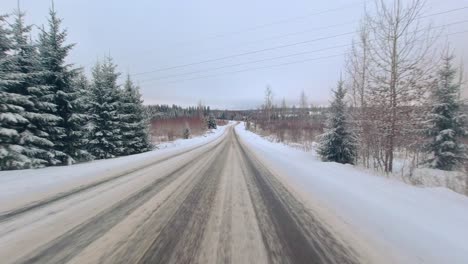 pov winter drive in scenic open countryside northern climate finland