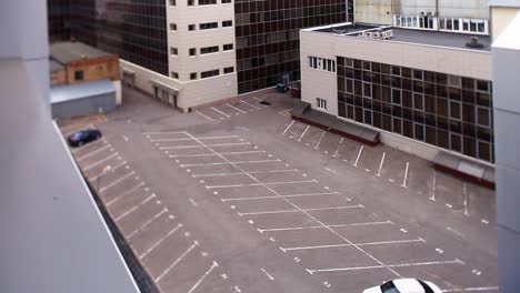 empty parking lot between buildings