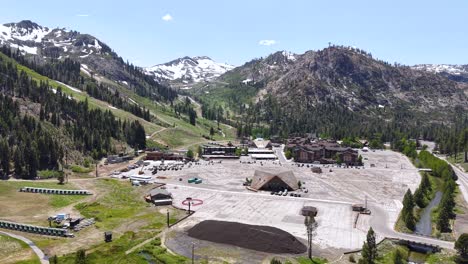 palisades ski resort in olympic valley, lake tahoe area, california usa on sunny summer day, revealing drone shot