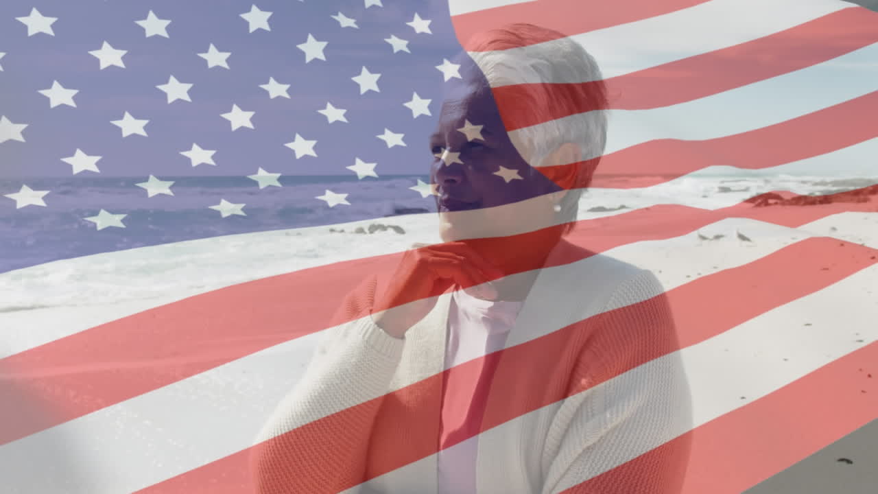 해변에 있는 고령 한 인종의 여성 위에 있는 미국 국기의 애니메이션