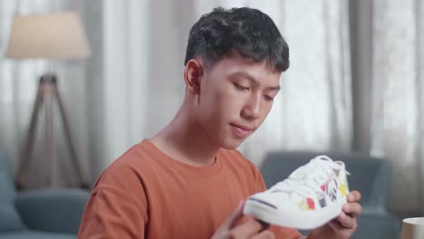 teenager reviewing sneakers
