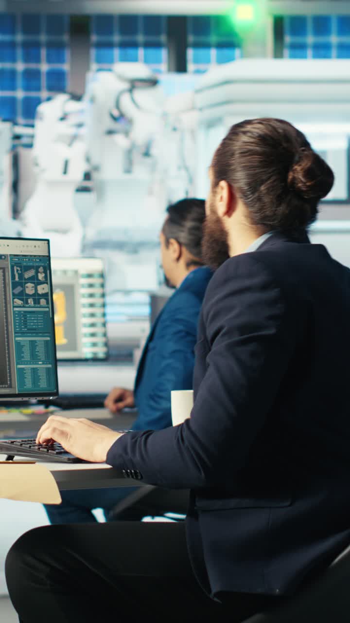 Vertical Video Photovoltaics Factory Manager Arriving In Office, Visualizing Designs On Pc