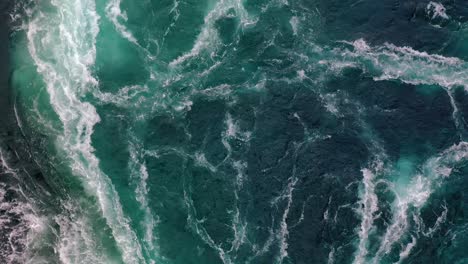 waves of water of the river and the sea meet each other during high tide and low tide.