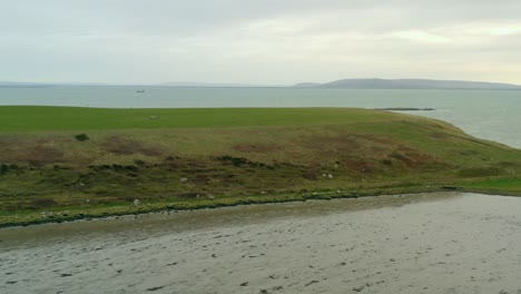 aerial pan of galway coastline with headlands, cliff walks, and rusheen bay, ireland