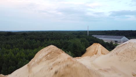 raw sand material local quarry, close up fly over view