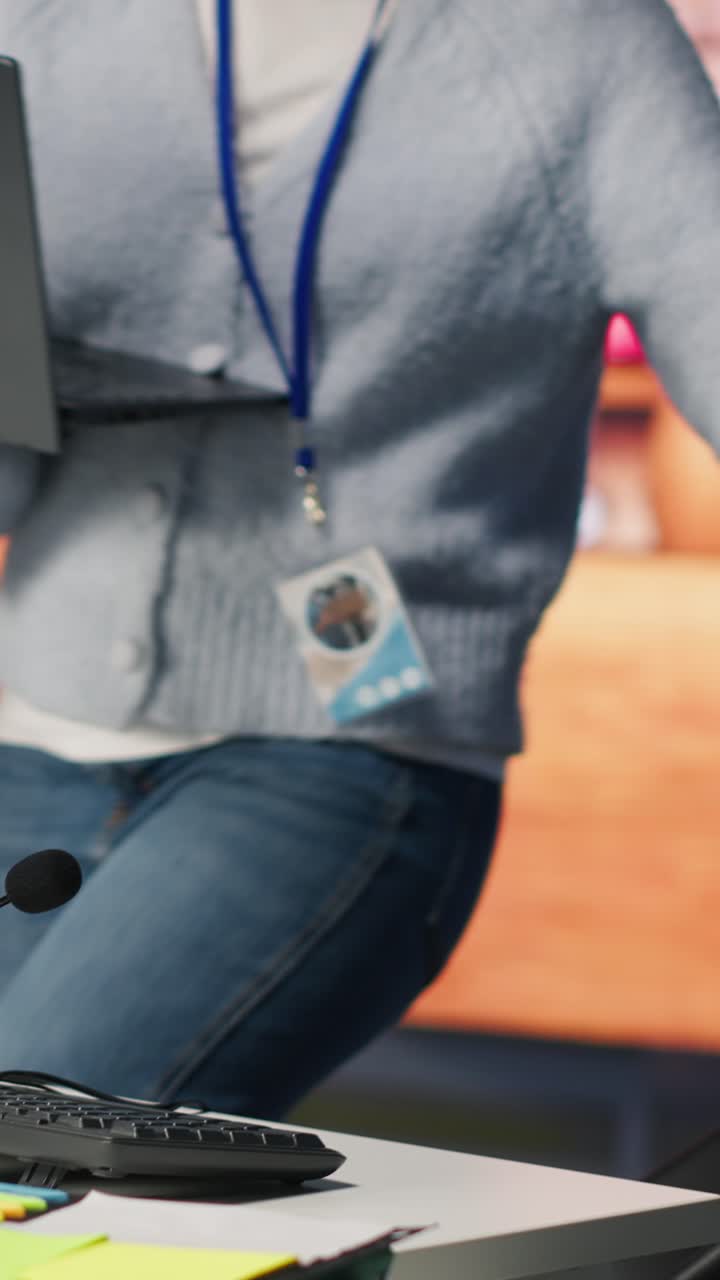 Vertical video Customer support agent arriving at work, entering office