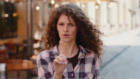 displeased upset young woman girl reacting to unpleasant awful idea wave hand finger shake head no