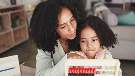 family, mother and child learning on abacus