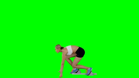 vista de perfil de la deportista se está preparando para el comienzo